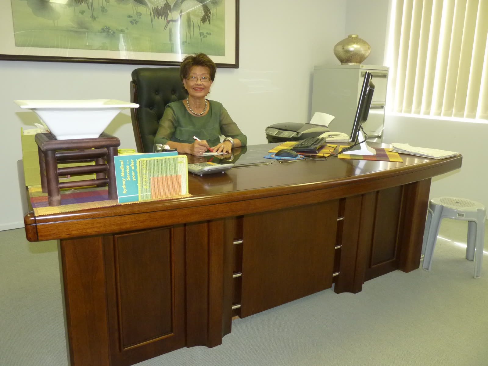 Boonma at her desk in the office