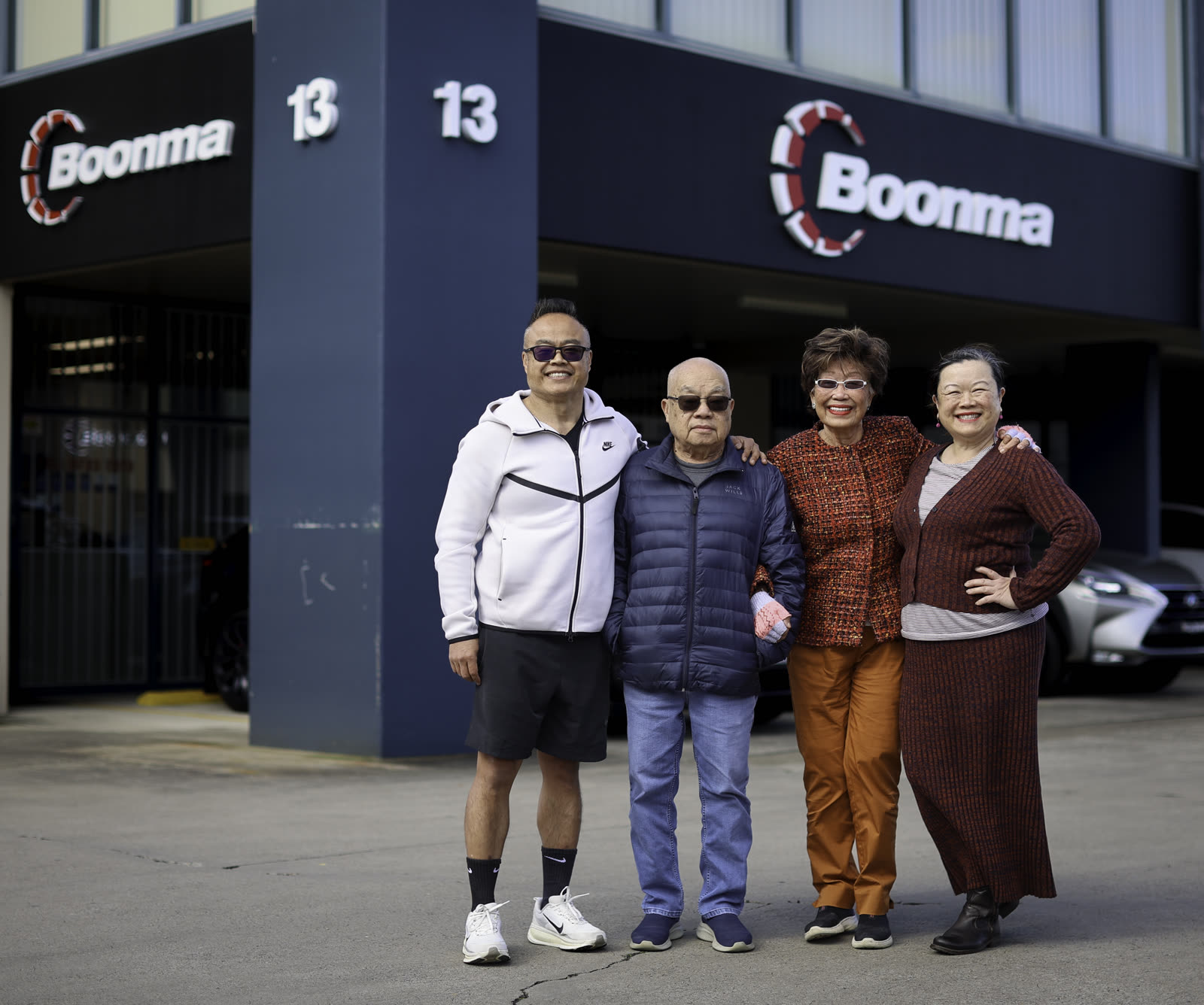 The originals outside the current Lansvale warehouse, under the new Boonma sign